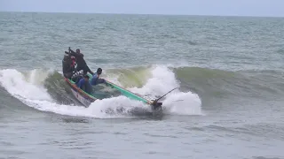 Incredible video - Fishing boat caught in a sea