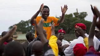 Police and anti-corruption protesters clash outside Zambian parliament