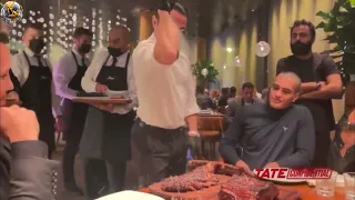 andrew tate enjoying $10,000 meal with salt bae