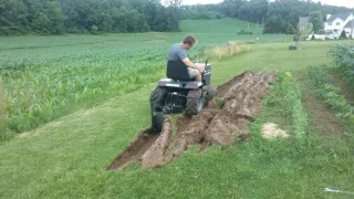 Craftsman Garden tractor plowing