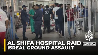 Israeli forces raid the al-Shifa hospital where thousands of Palestinians are taking shelter