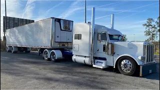 Peterbilt 389  pull a 53 ft spread axle White sided￼ Great Dane refer trailer