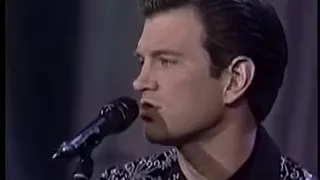 Chris Isaak sings "Solitary Man"