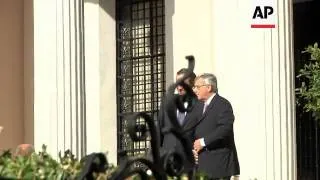 Juncker arrives for talks as Samaras calls for more time to make cuts