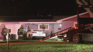 Car crashes into St. Pete home, suspects in custody