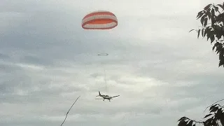 Powerless Plane Lands With Attached Emergency Parachute!!