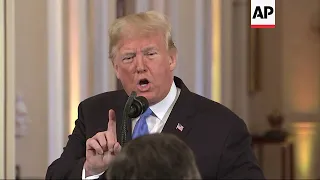 Trump clashes with media at heated news conference
