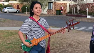 Tenzin Yeshe teaches Tibetan Danyan guitar. Player Kalsang Dolkar and Tsomo 🌏ZaSer Rigsang VP91