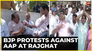 Protest Vs Counter Protest In Delhi As AAP Stage Protest Outside Part HQ & BJP Protests At Rajghat