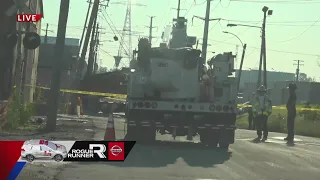 Driver trapped in truck after hitting a utility pole