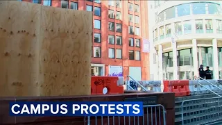 Plywood goes up at NYU after hundreds of protesters arrested