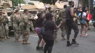 Watch: National Guard members dance with protesters in Downtown Atlanta