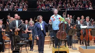 Sheku Kanneh-Mason getting flowers from a little guy