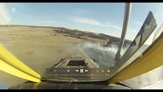 Ride with a single engine air tanker dropping near Borger, Texas