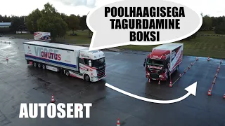 Poolhaagisega tagurdamine boksi. Autosert.