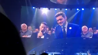 Audience member Carl-Henrik Nilsen singing Stardust with Michael Bublé