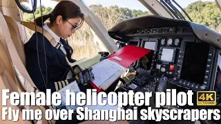 Female helicopter pilot fly me over Shanghai skyscrapers