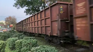 Cargo train passing a crossing in Niš, Serbia.