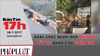 PLO - Hàng chục người dân Biên Hòa đốt xe, đánh 2 kẻ trộm chó