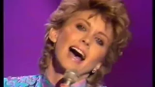 Olivia Newton- John-   Make A Move On Me