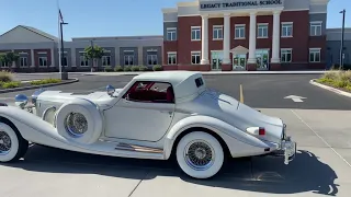 White Excalibur Roadster with Rumble Seat