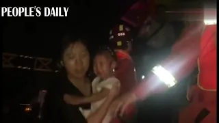 Firefighters in Zhengzhou, central China’s Henan Province, rushed to rescue trapped residents