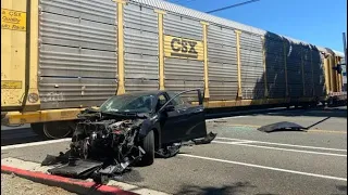 **MUST SEE** car hits Union Pacific Autorack and gets totaled