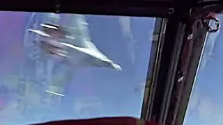 SU-27 Fighter Headbutts a B-52 Bomber