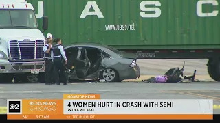 4 women hurt in crash with semi