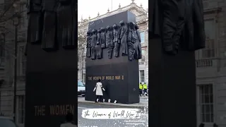 Emma Watson being a book fairy at The Women of World War II's memorial in London