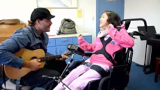 Amber's Music Therapy Session with Adaptive Communication Device