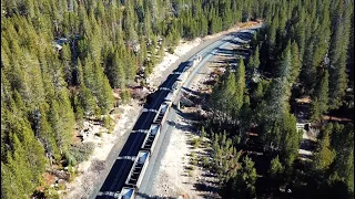 4K: Aerial chase of a Union Pacific over Donner Pass, Shed 10, & Soda Springs, CA