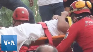 Izmir Rescuers Pull Survivors From Rubble