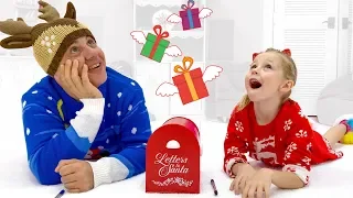 Nastya and dad open presents for Christmas