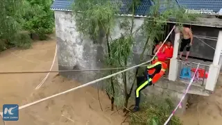 6-month-old baby rescued in floods in Zunyi, China