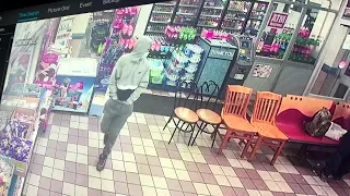 Surveillance video shows armed suspect shoot store employee during attempted robbery