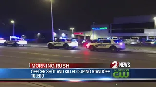 Toledo police officer, suspect killed after armed standoff