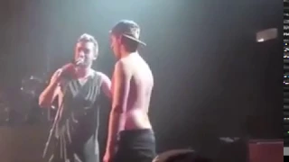 a fan screamed "you saved my life" and tyler joseph called him up and hug