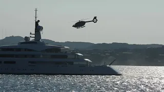 Mega yacht. helicopter taking off from yacht