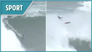 Huge waves of Nazare sends surfer flying