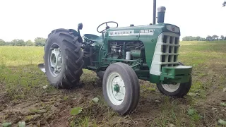 Oliver 550 tractor plowing with Oliver 3240 2 bottom plow