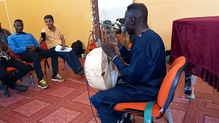 Master Ebrahim Galissa, Guine B, playing KORA, the West African traditional musical instrument, JU