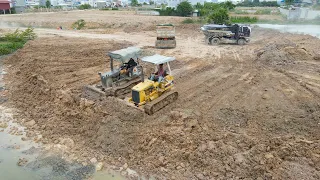 The Best New Project Landfill by Operator Bulldozer Push Soil with Truck Unloading Soil in Water