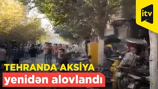 Tehranda aksiya yenidən alovlandı: Şəhərdə bir neçə binaya od vuruldu