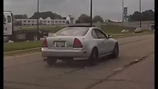 Silver Honda Prelude on War Memorial Drive in Peoria.