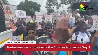 Protestors march towards the Jubilee House on Day 2