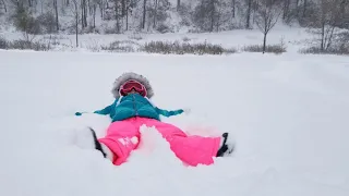 Emma making a snow angel,  November 11, 2019