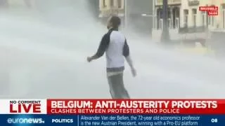 Police drench protesters with water cannons at Belgium Anti-austerity demonstration