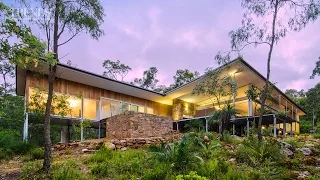 Modern new home in bush setting, Western Australia, features teak, local stone and concrete floors