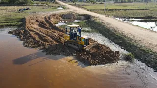 Stunning Road Building Technology Mighty Power Bulldozer Spreading Dirt with Dump Truck Moving Dirt